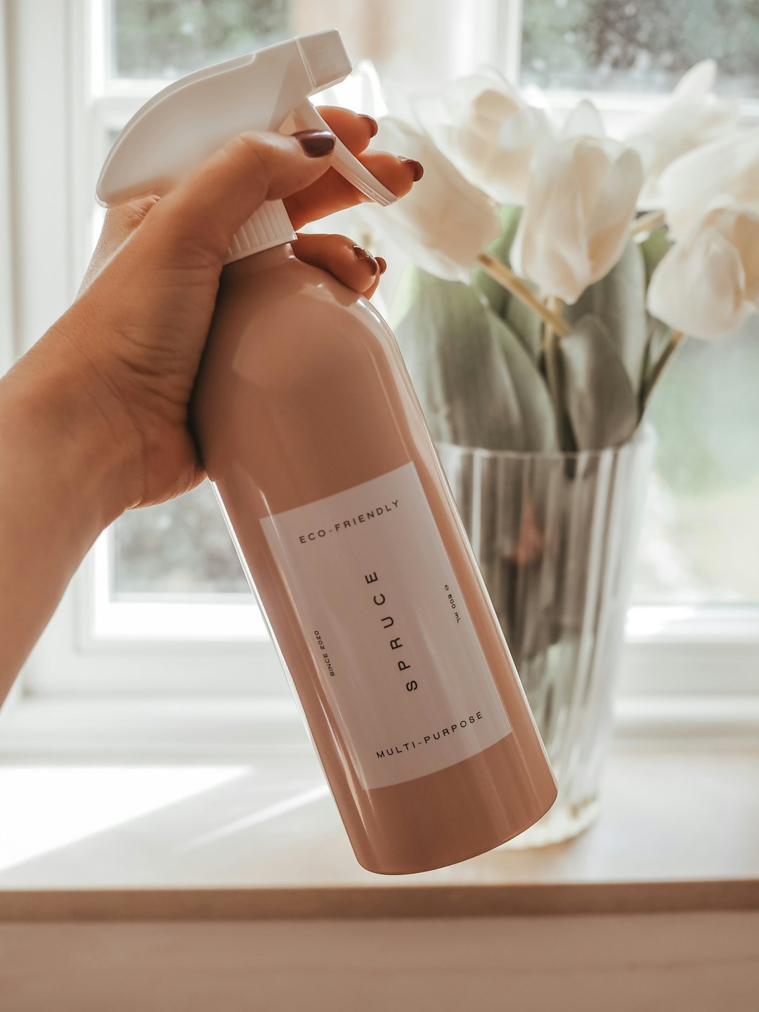 services-01 person-holding-a-brown-plastic-bottle-hknpx2aucxi